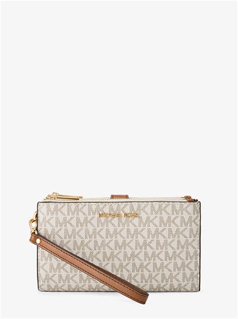 michael kors jet set travel smartphone|Jet Set Travel Signature Logo Smartphone Wallet .